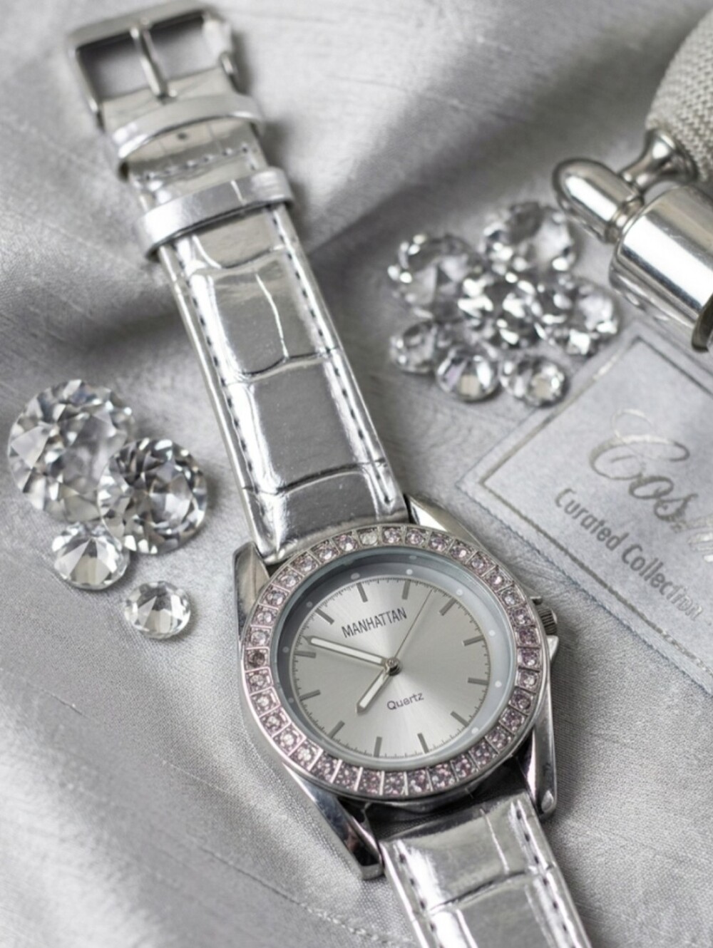 ​Manhattan by Croton Women’s Silver Quartz Watch Crystal Bezel Leather Strap